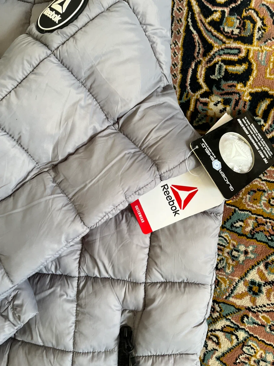 Brand new with tag Reebok Puffer Jacket - Size L image indicator(4)
