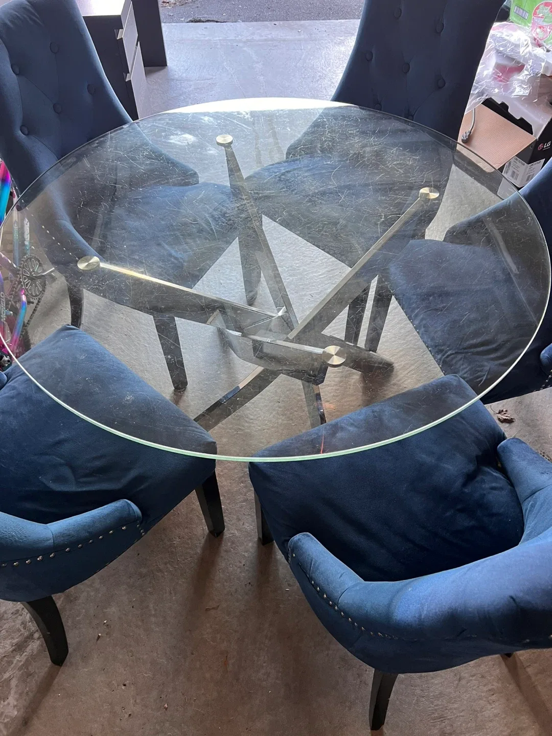 Glass Top Dining Table with 5 Blue Chairs