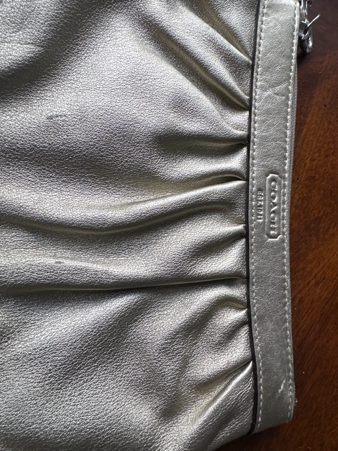 Coach Metallic Silver Leather Clutch