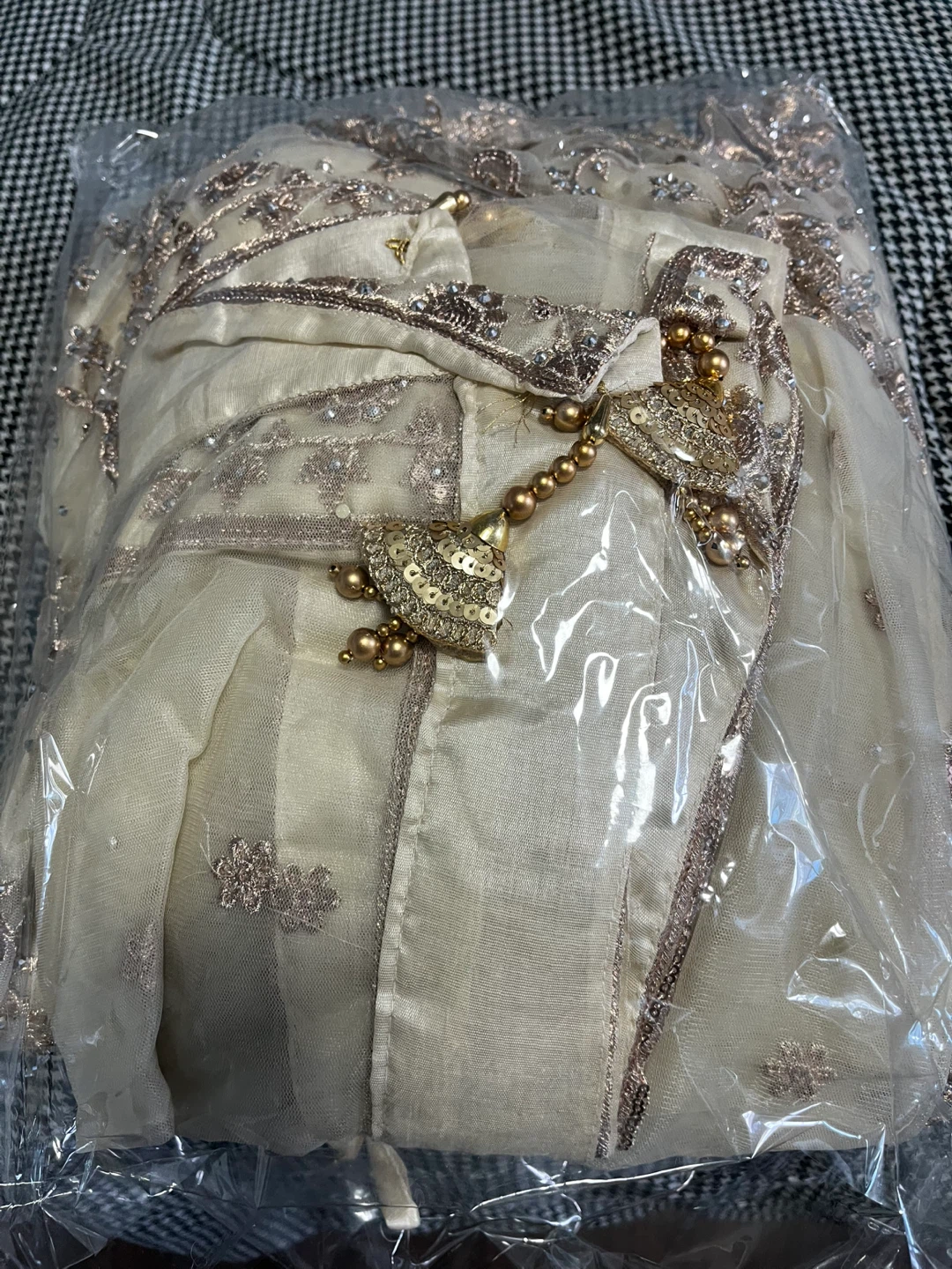 Light gold lehnga with long kurti with long net