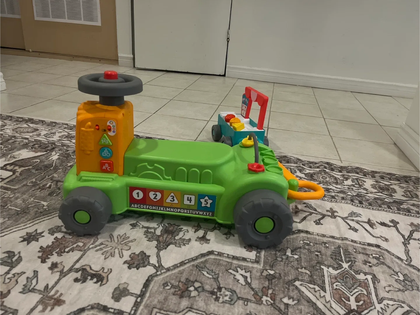 Fisher-Price Tractor Ride-On Toy with Wagon image indicator(2)