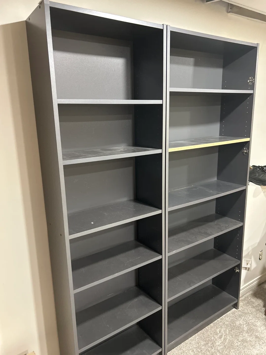 Two Grey Bookshelves