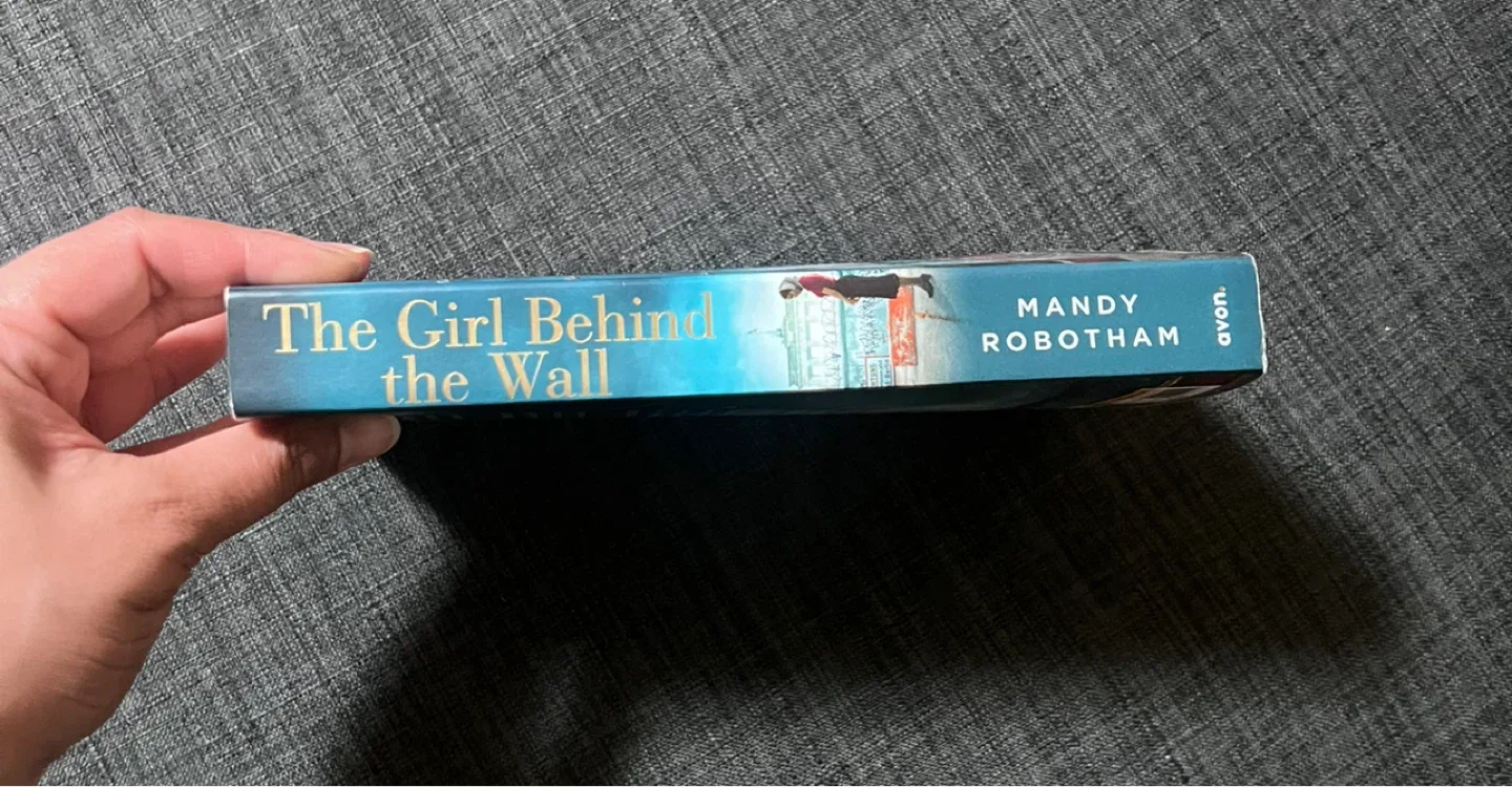 "The Girl Behind the Wall" by Mandy Robotham image indicator(2)