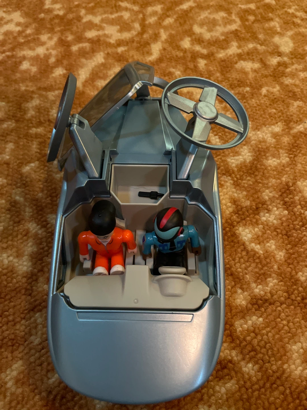 Toy fire truck and a toy Roblox jail brake car - photo 2