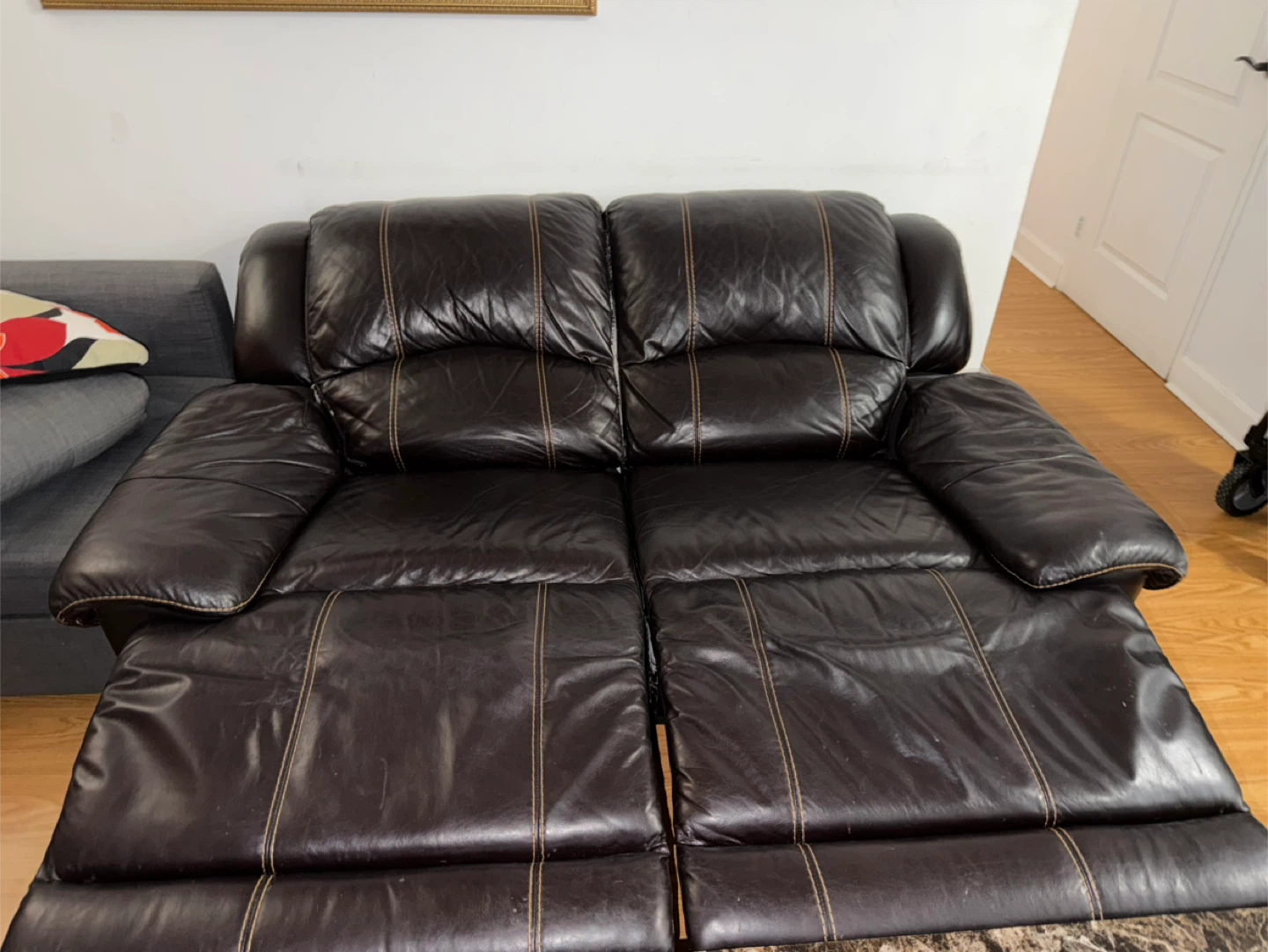 Brown Leather Reclining Loveseat