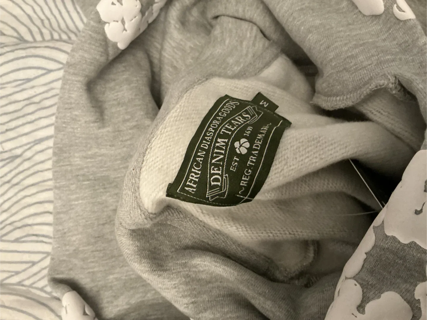 Grey denim tears hoodie image indicator(3)