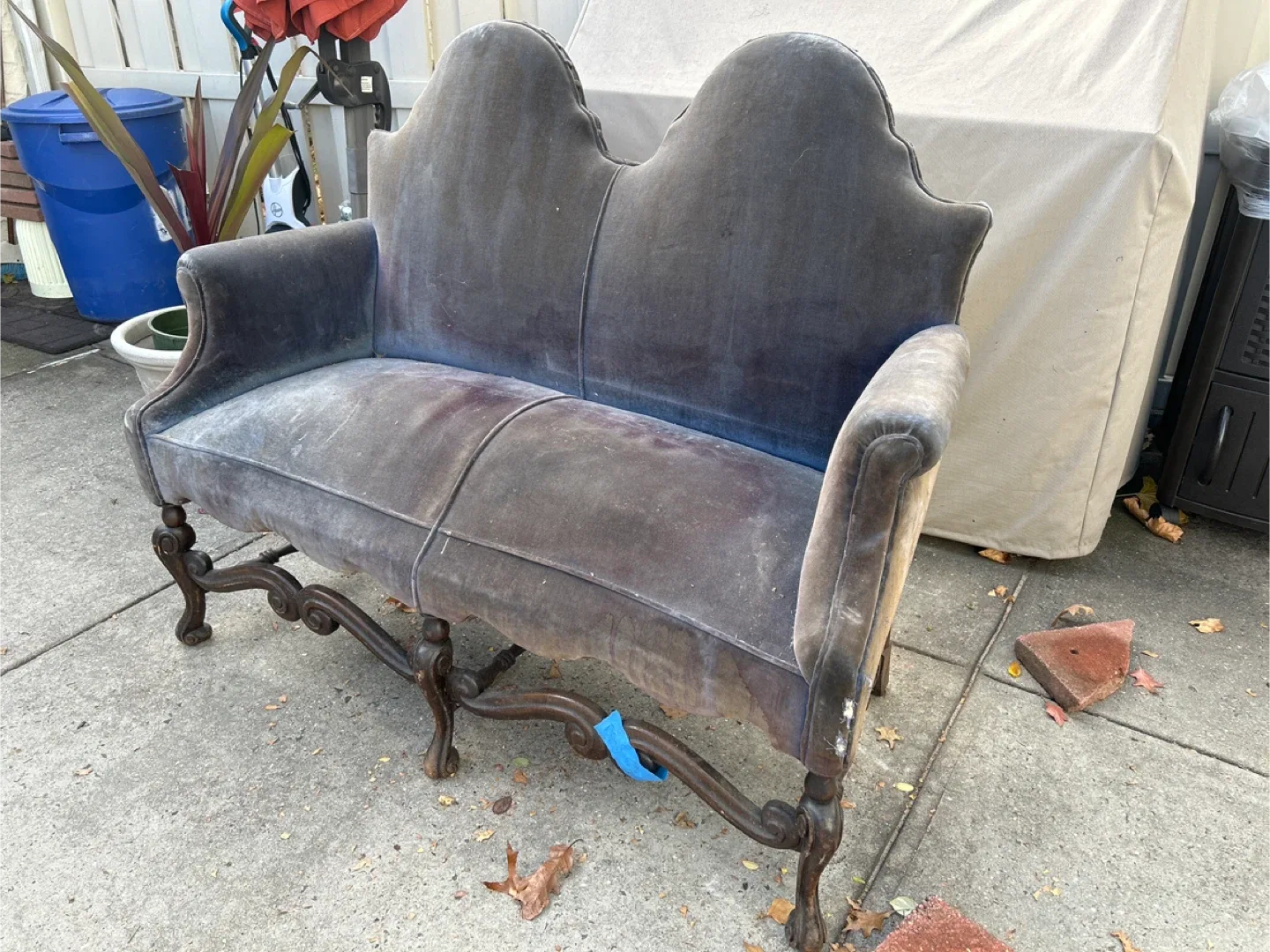 vintage or antique velvet settee with a carved wood frame image indicator(3)