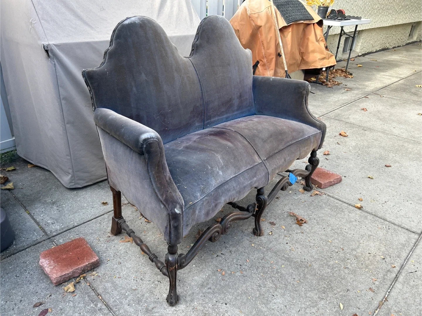 vintage or antique velvet settee with a carved wood frame image indicator(2)