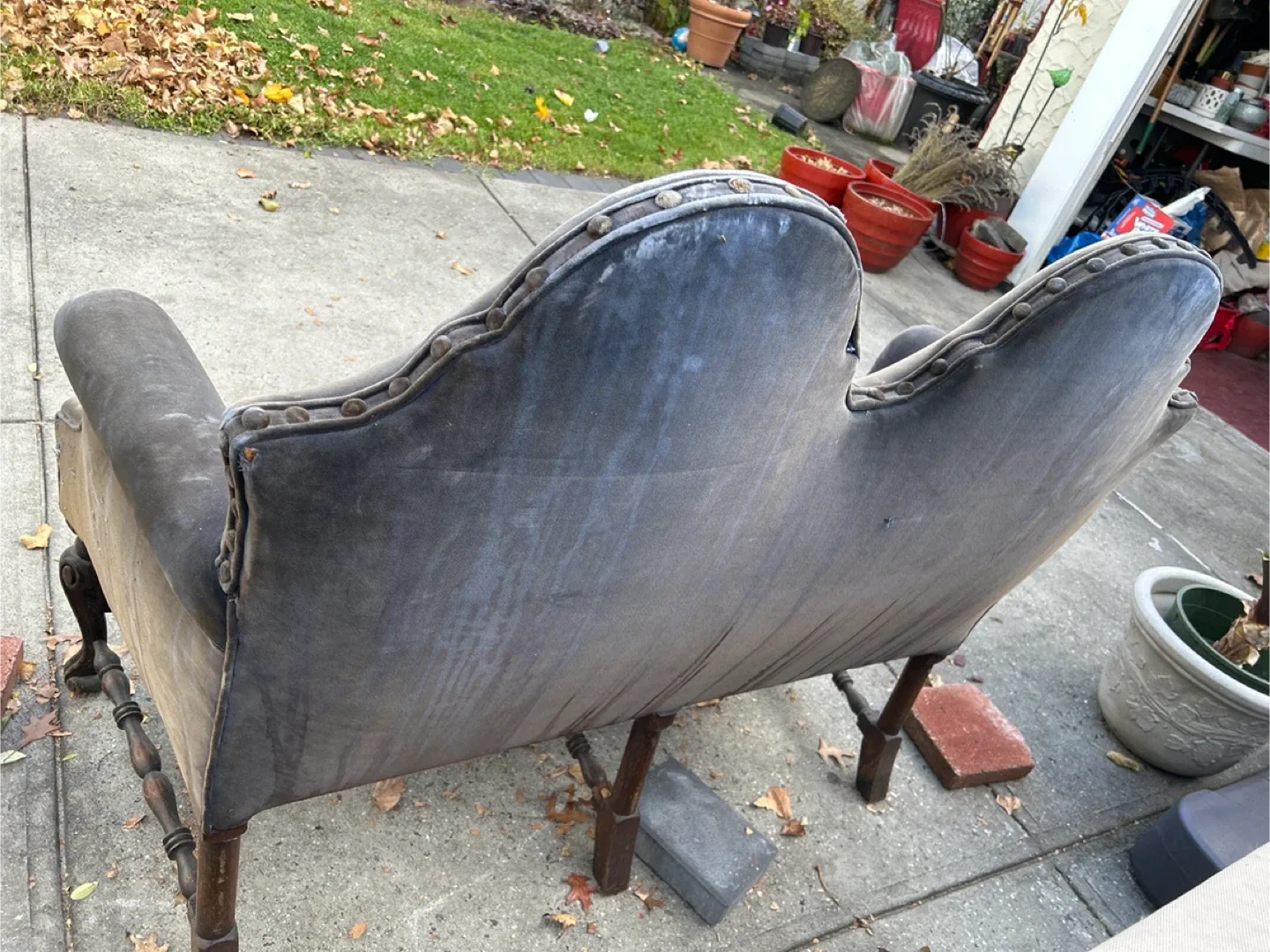 vintage or antique velvet settee with a carved wood frame image indicator(7)