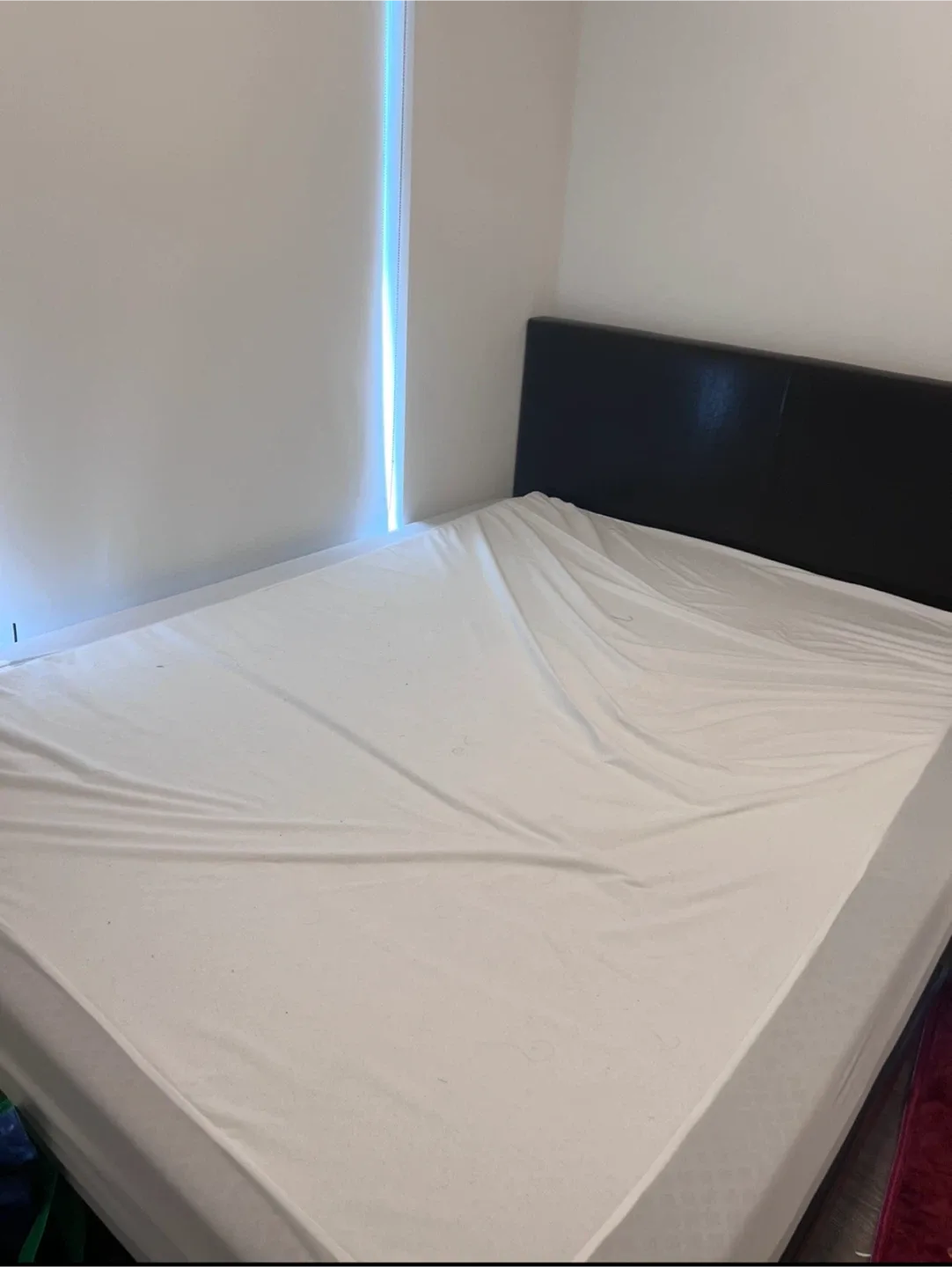 Bed frame with headboard and mattress