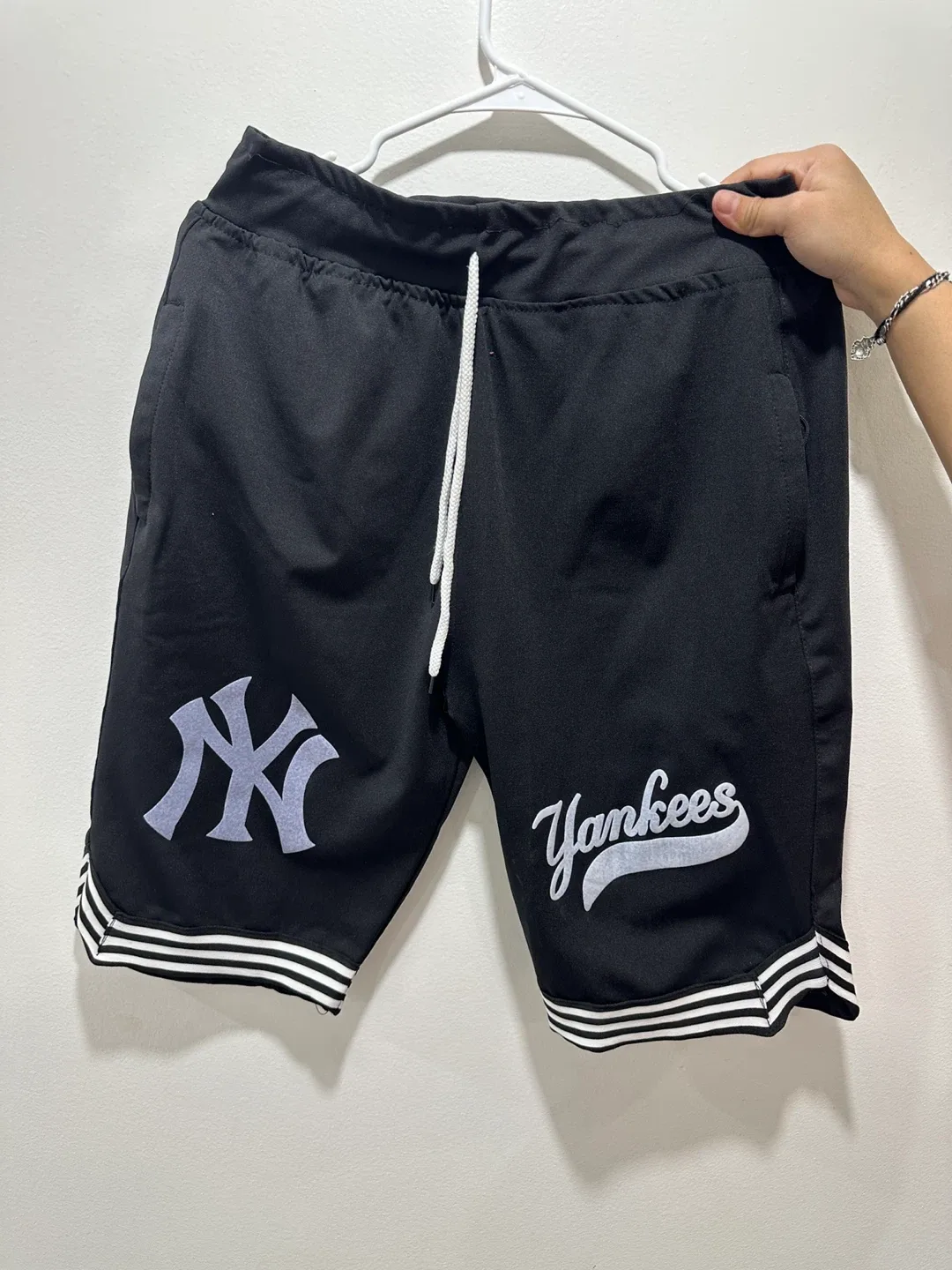 Assorted Men's Shorts: Jordan, Yankees, Adidas image indicator(2)