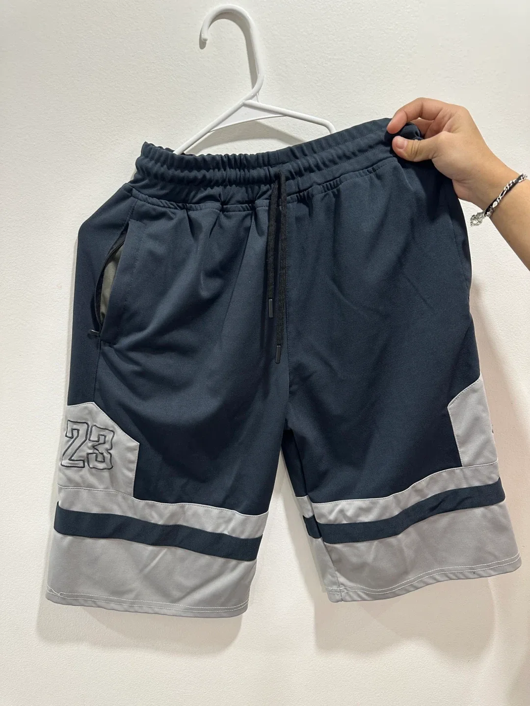 Assorted Men's Shorts: Jordan, Yankees, Adidas image indicator(5)