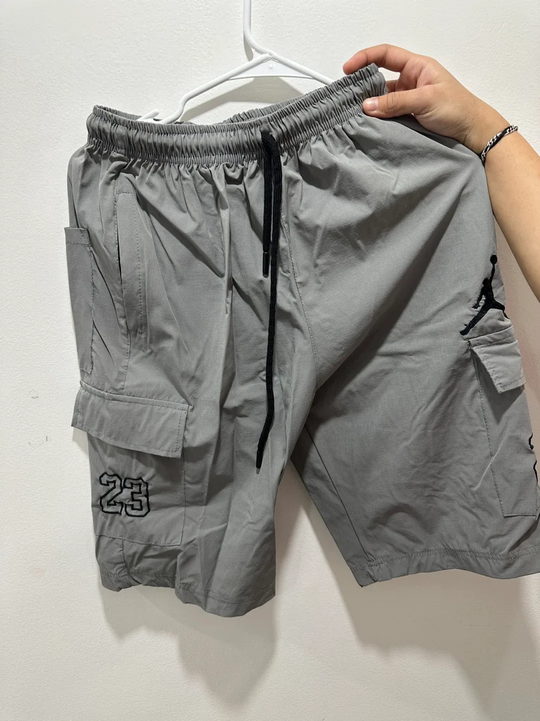 Assorted Men's Shorts: Jordan, Yankees, Adidas image indicator(3)