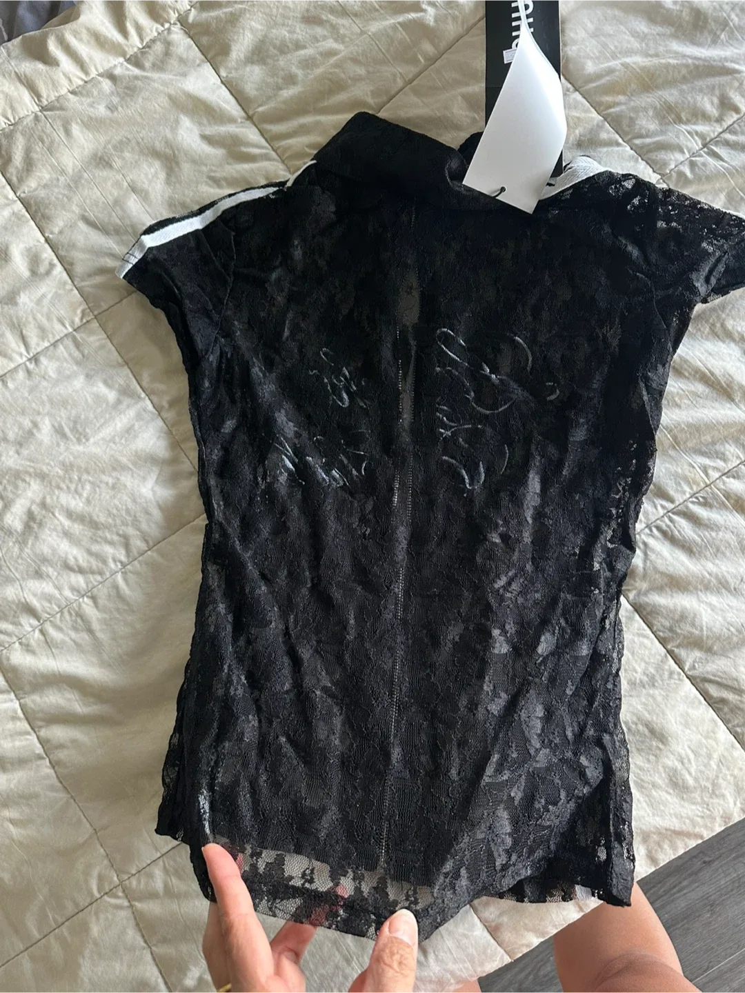 Selling a cute black lace top.! image indicator(4)