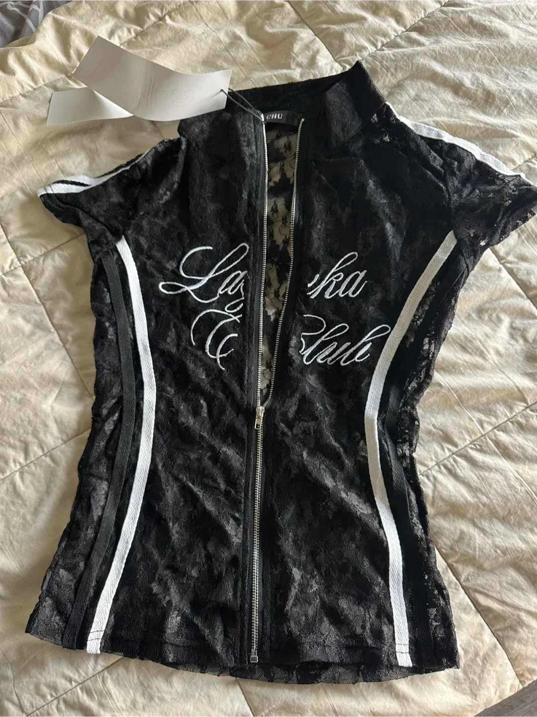 Selling a cute black lace top.!