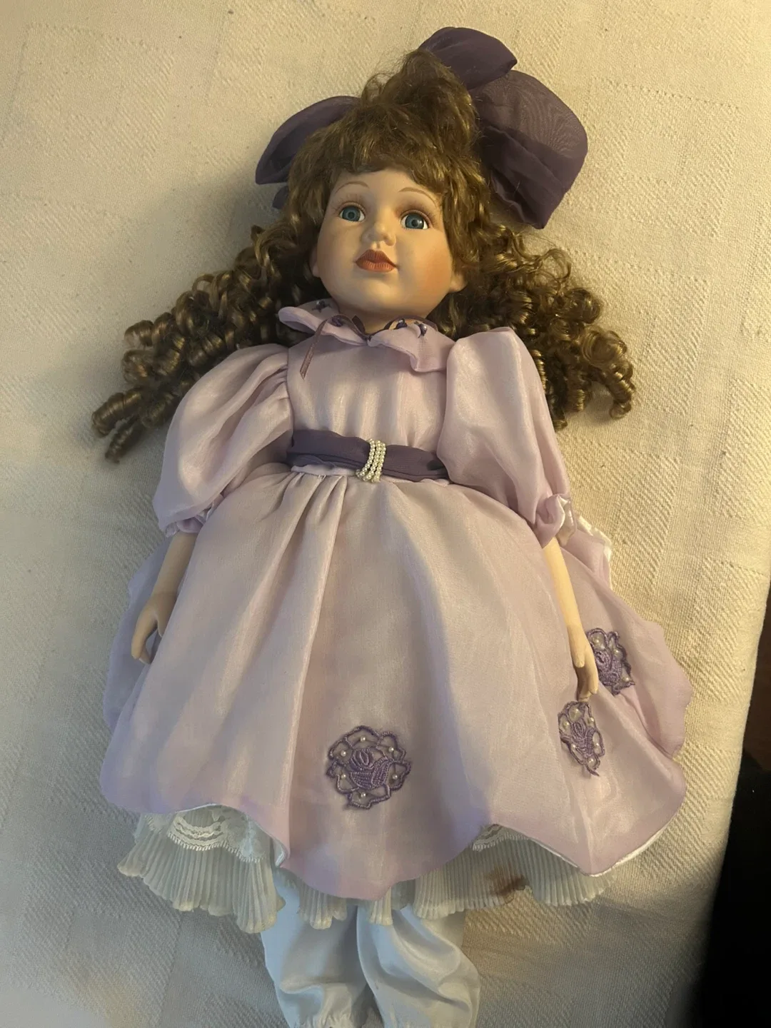 Porcelain Doll in Lilac Dress
