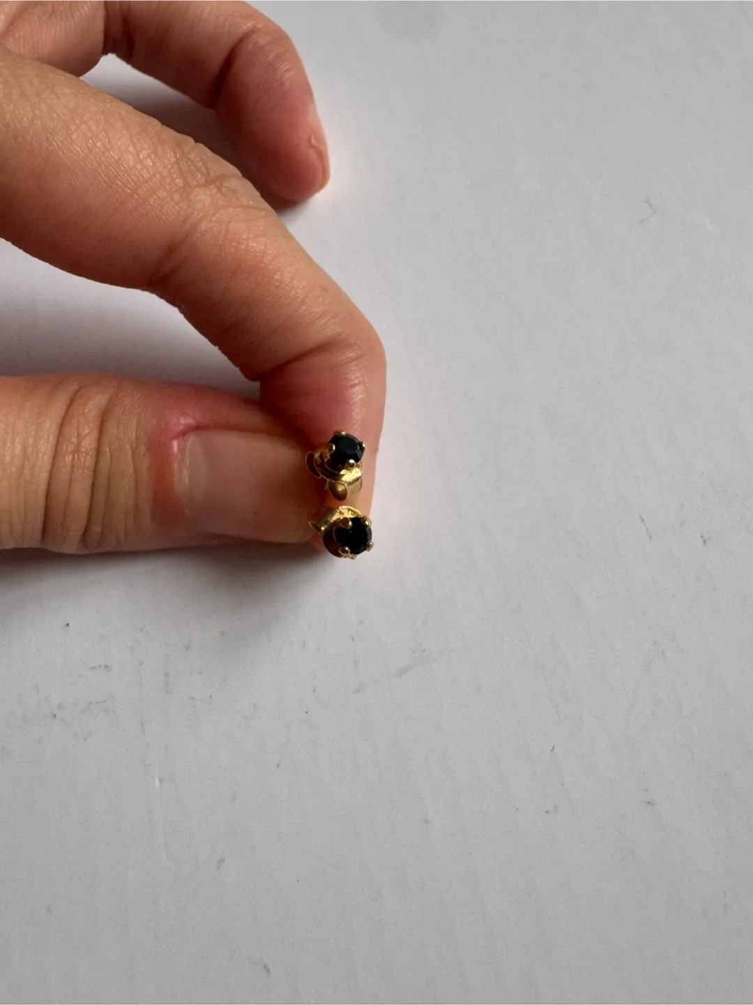 Gold Stud Earrings with Black Gemstones image indicator(5)