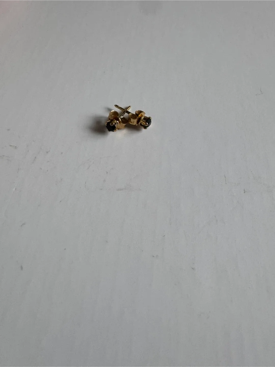 Gold Stud Earrings with Black Gemstones image indicator(7)
