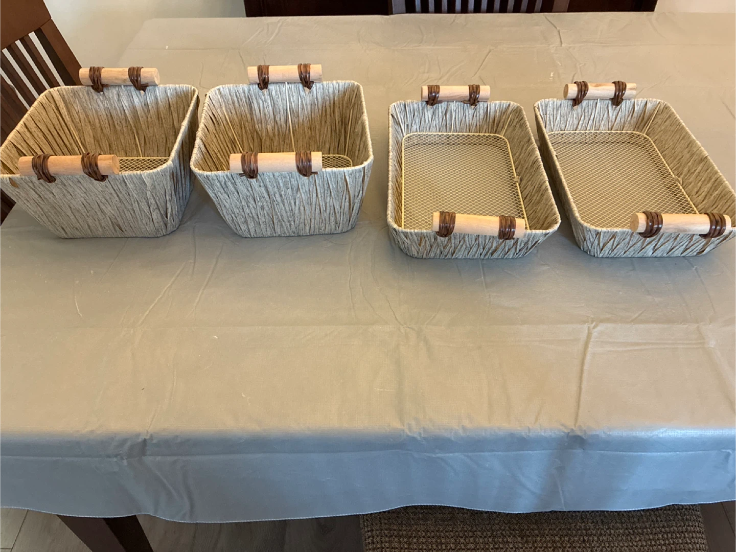Never used Set of 4 Woven Baskets with Handles