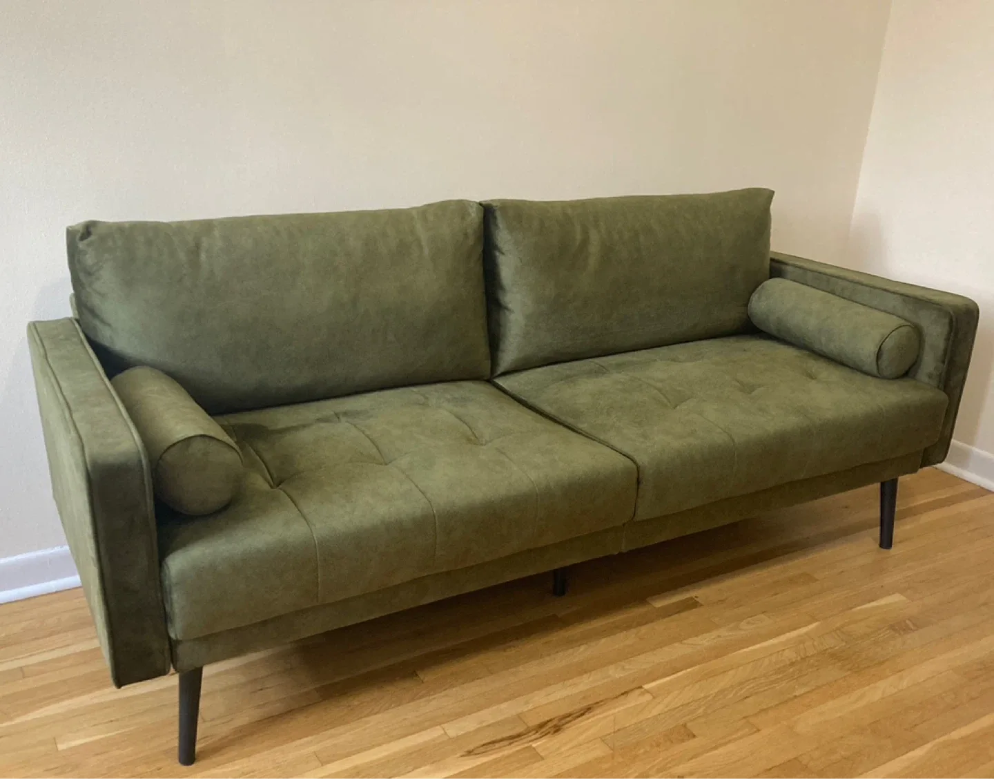 Green Sofa with Bolster Pillows