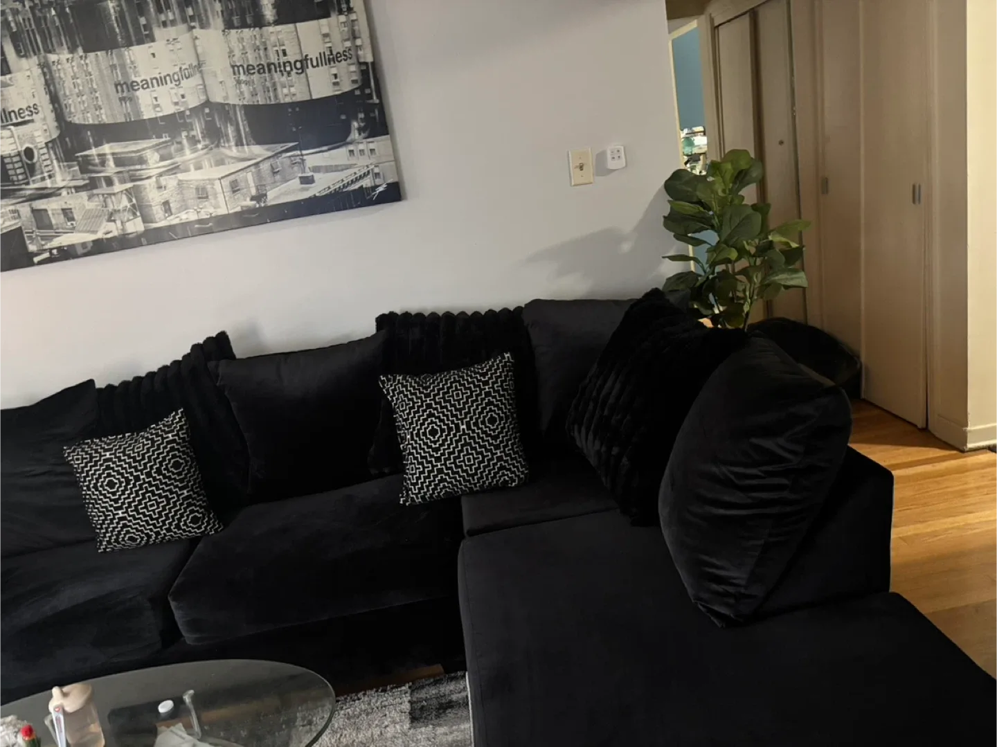 Black Sectional Sofa with Pillows