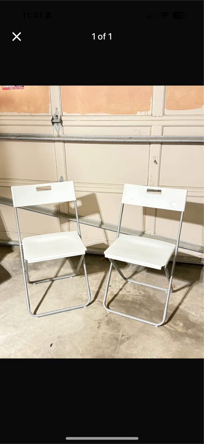 Two White Folding Chairs ($12 each)