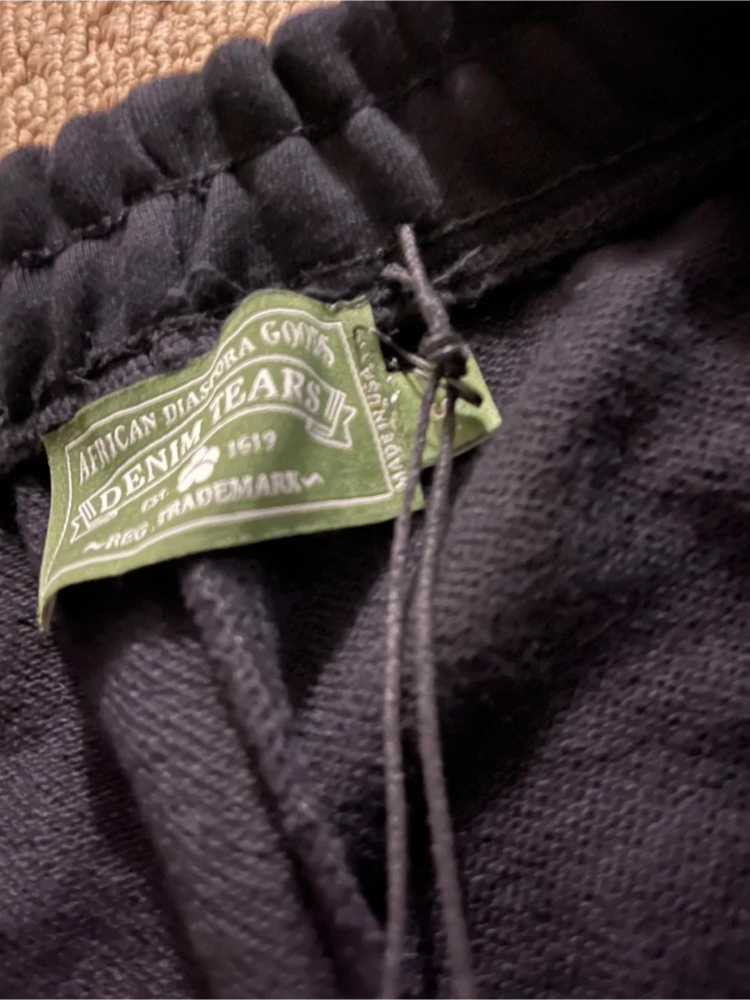 Denim Tears African Diaspora Goods Sweatpants image indicator(3)