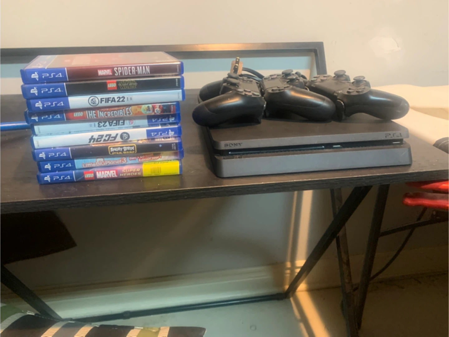 PlayStation 4 with Games and Controllers - photo 3