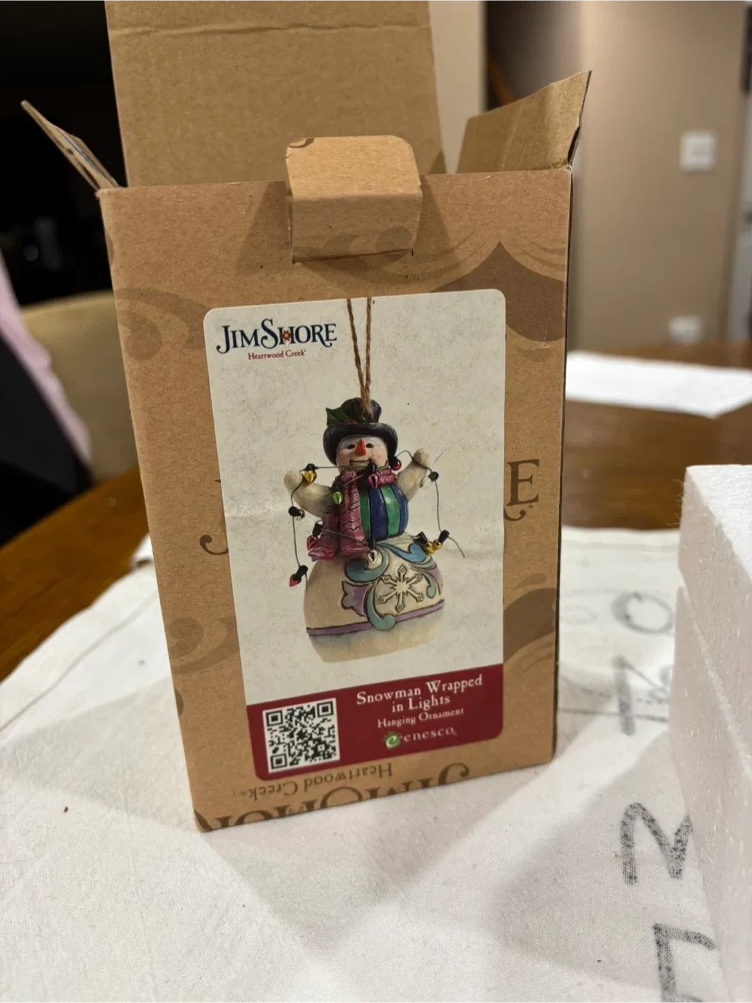 Jim Shore Snowman Wrapped in Lights ornament image indicator(8)