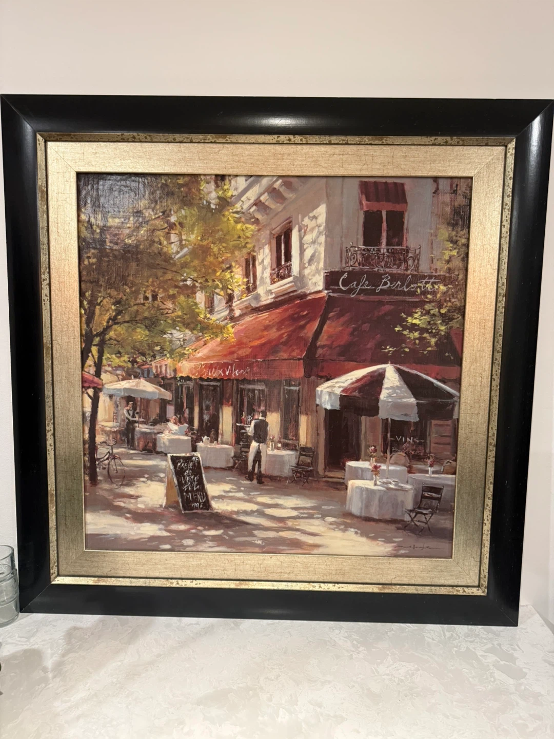 Cafe Berlotte Framed Print