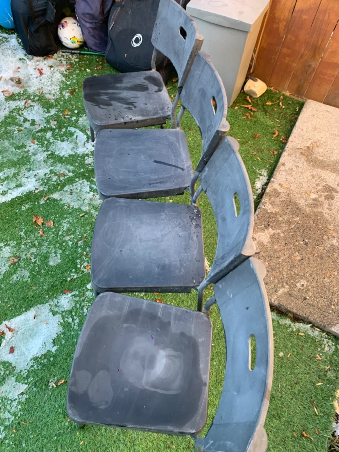 Four Black Plastic Chairs - furniture image indicator(4)