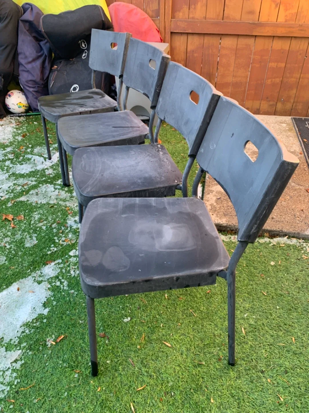 Four Black Plastic Chairs - furniture image indicator(7)