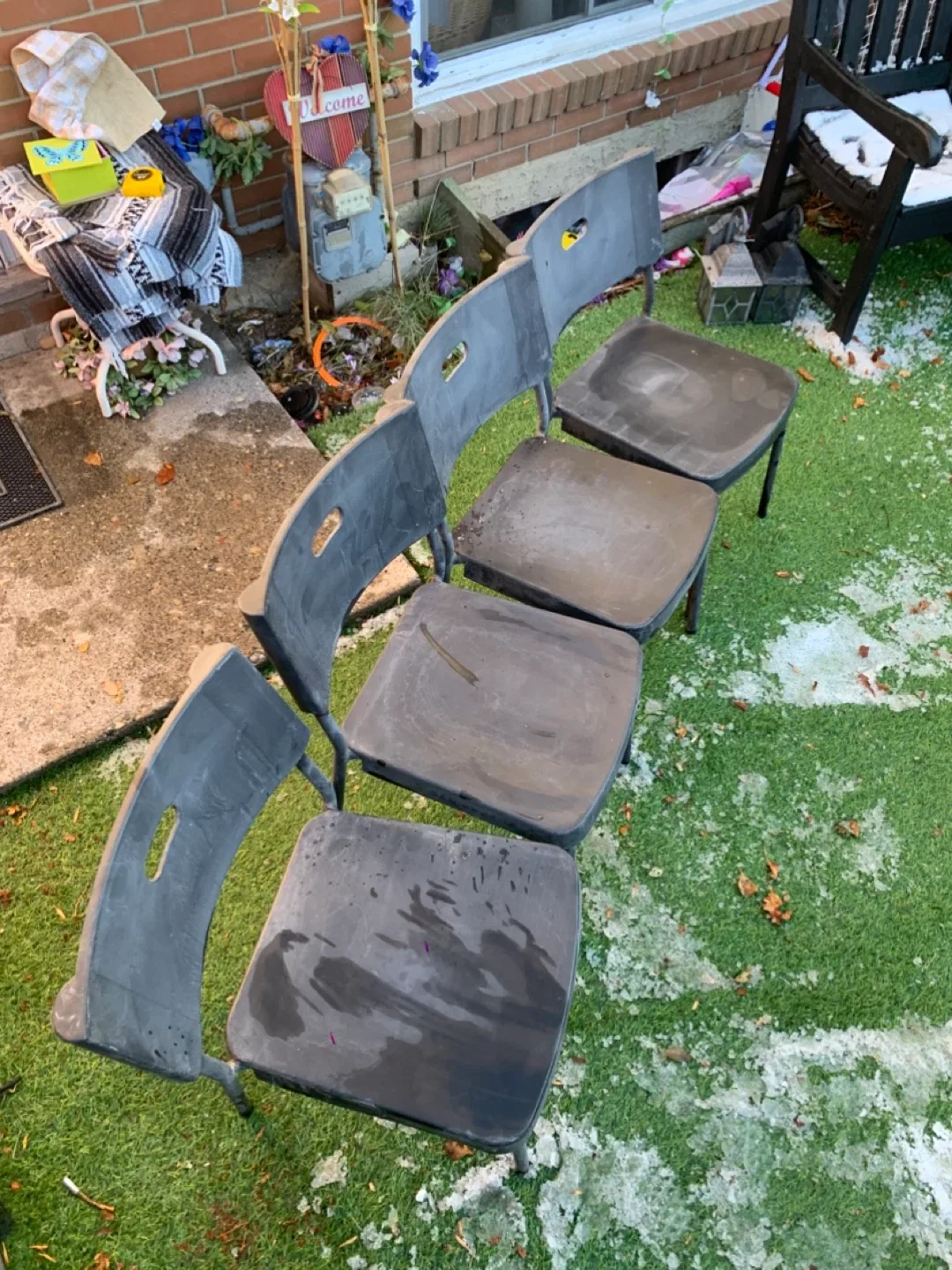 Four Black Plastic Chairs - furniture image indicator(3)