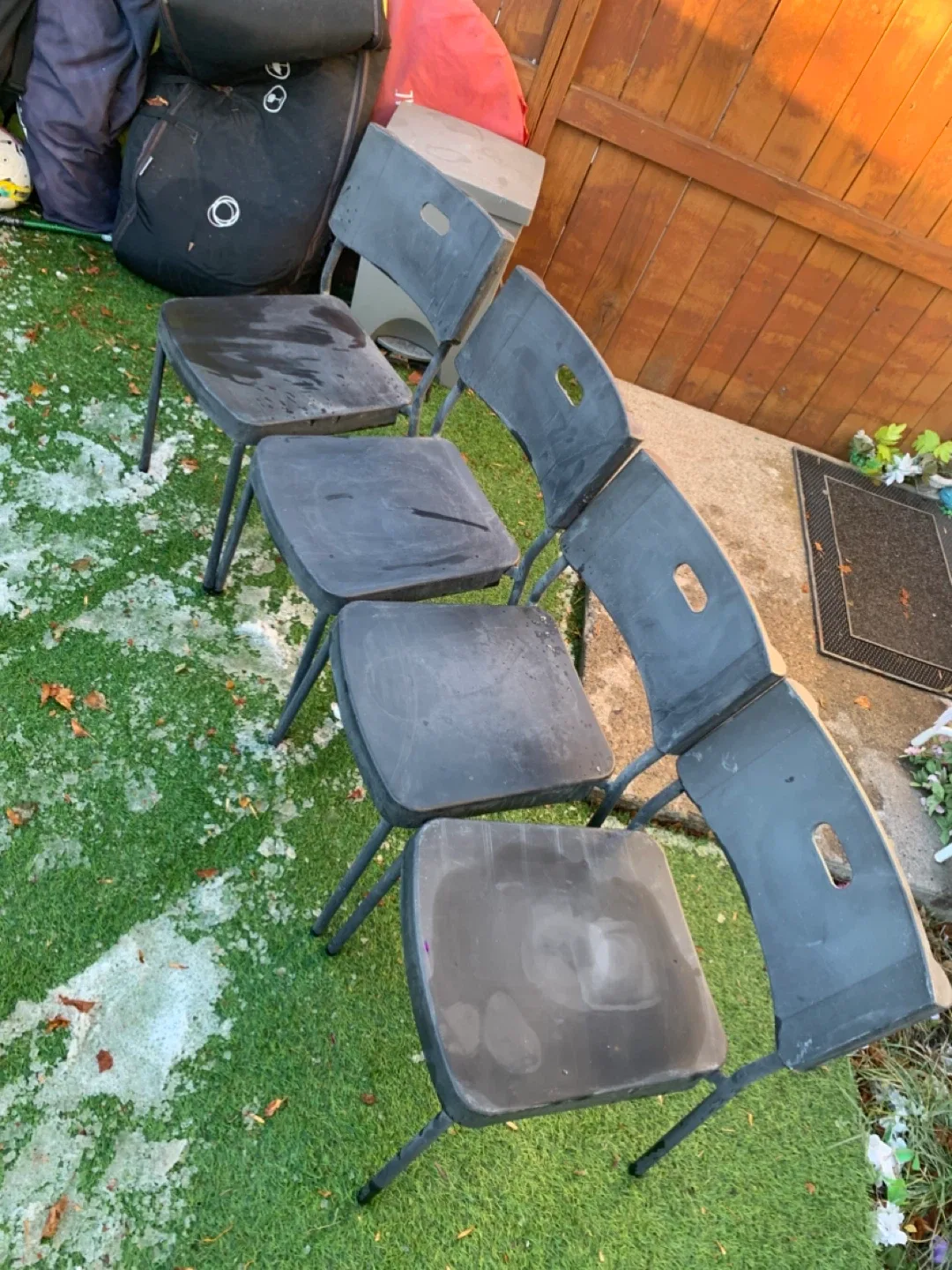 Four Black Plastic Chairs - furniture image indicator(2)