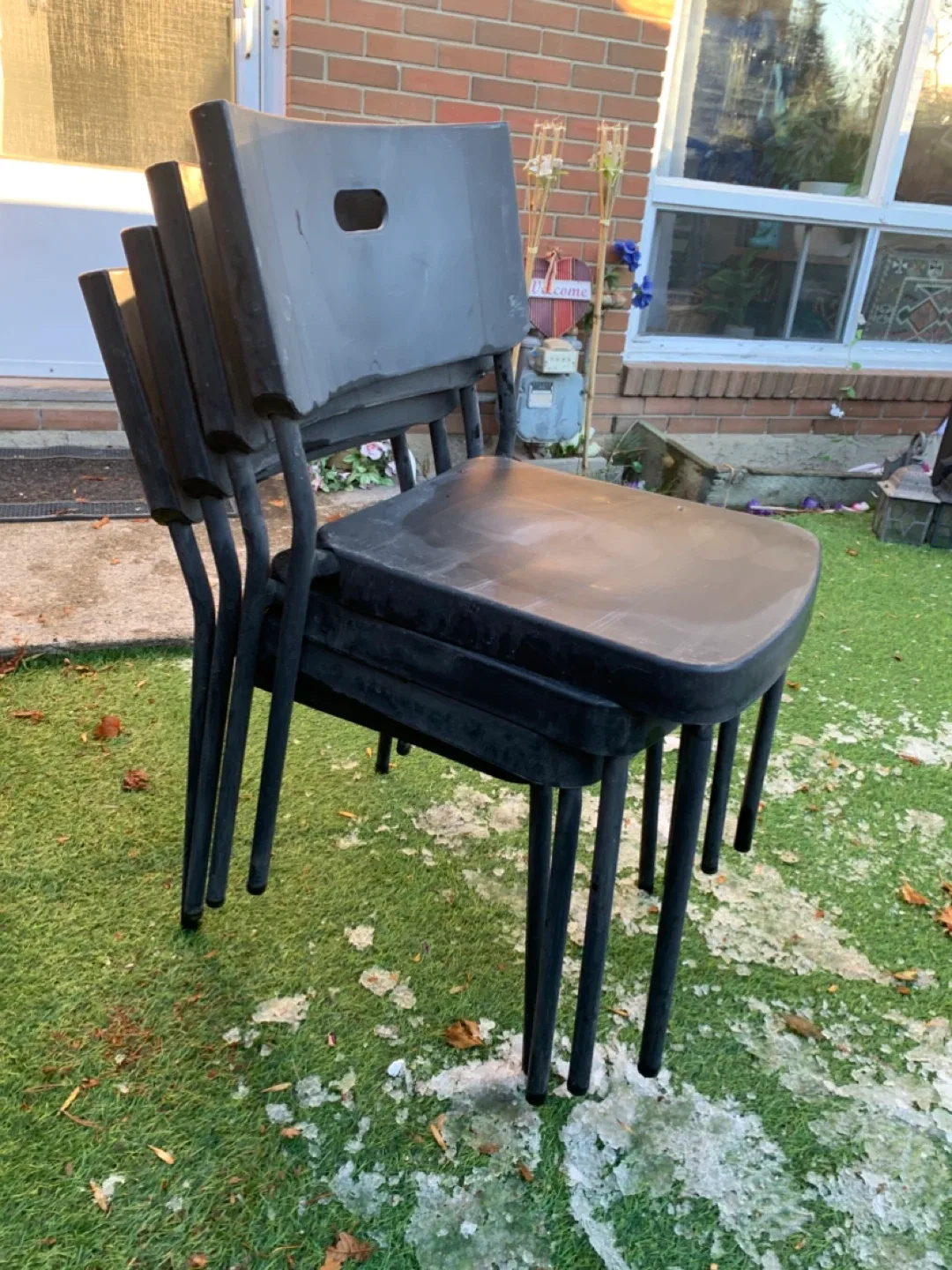 Four Black Plastic Chairs - furniture image indicator(8)