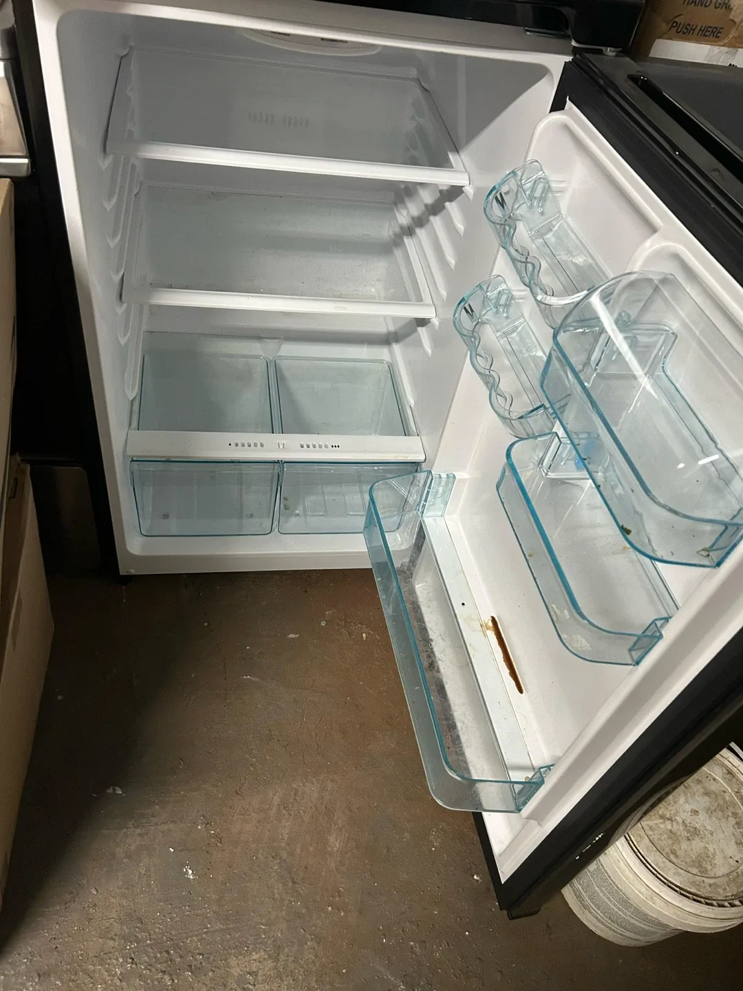 Stainless steel free standing refrigerator and one gas stove.. image indicator(3)