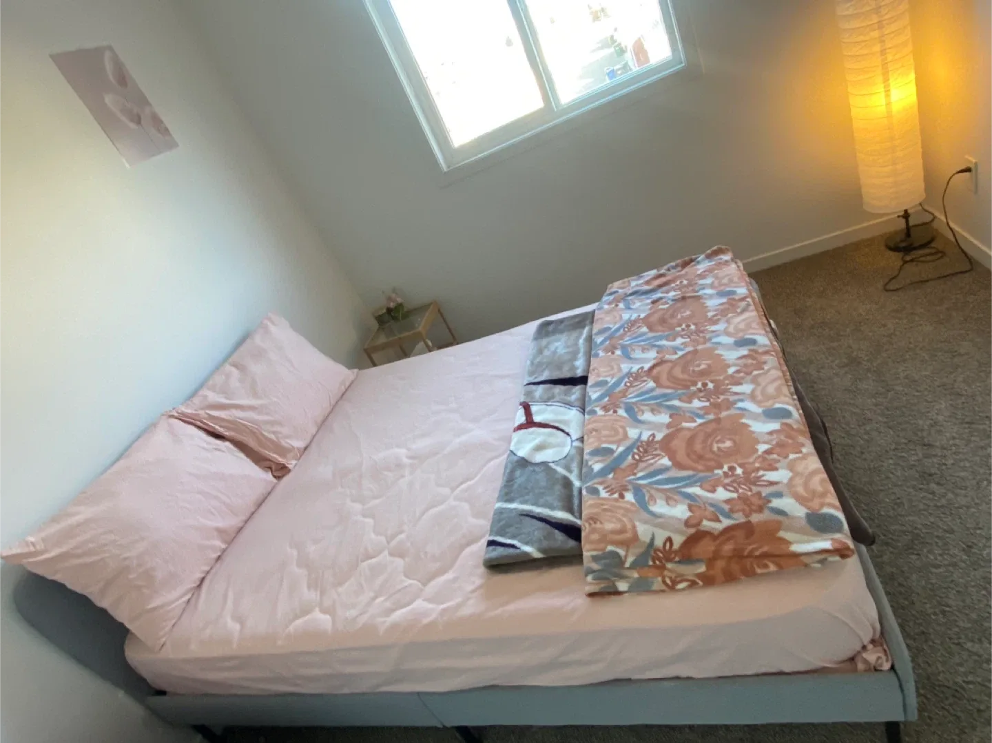 Queen Size Bed with Floral Blanket