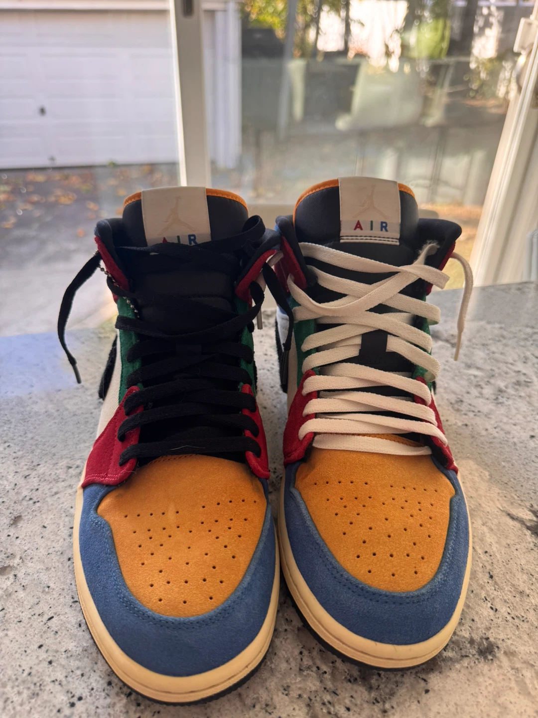 Nike Air Jordan 1 Mid x Blue The Great "Fearless" sneaker.