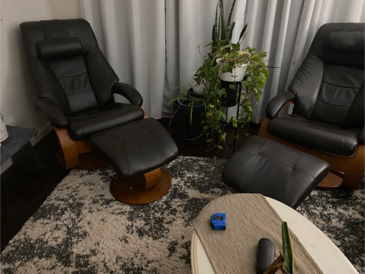 Black Leather Stressless Recliner with Ottoman
