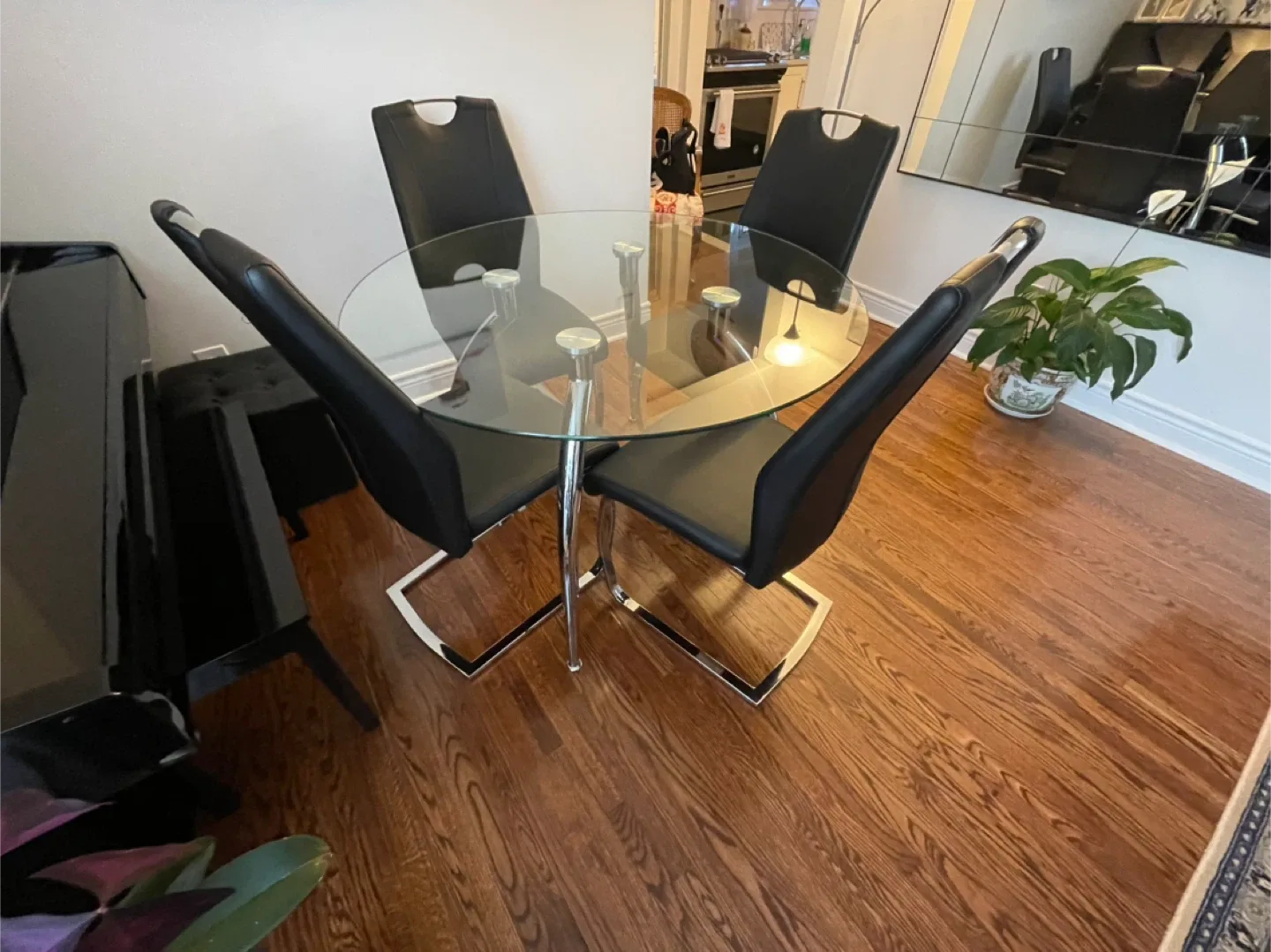 Glass Top Dining Table with 4 Black Chairs