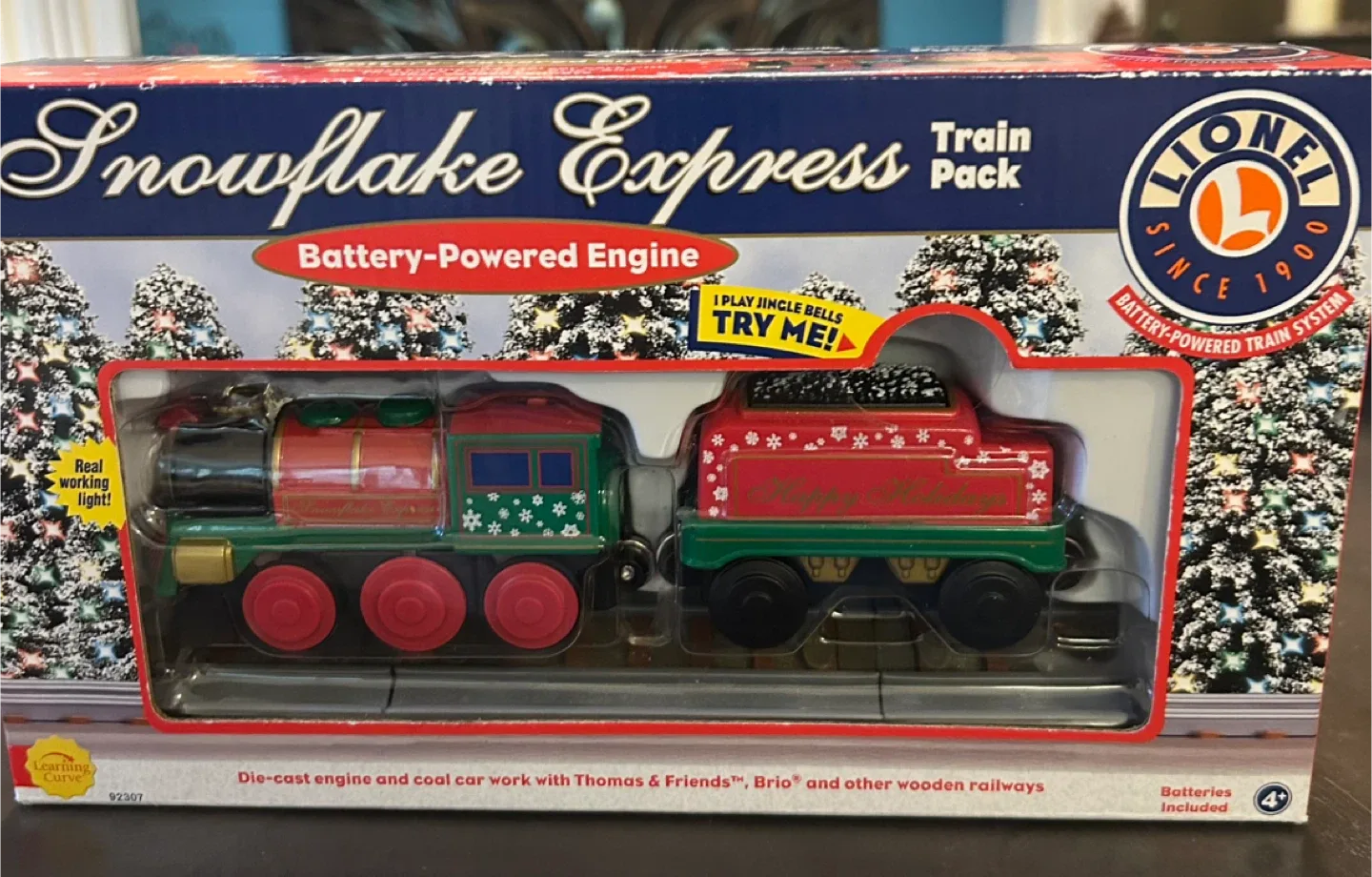 NIB Lionel Snowflake Express train . plays Jingle Bells.