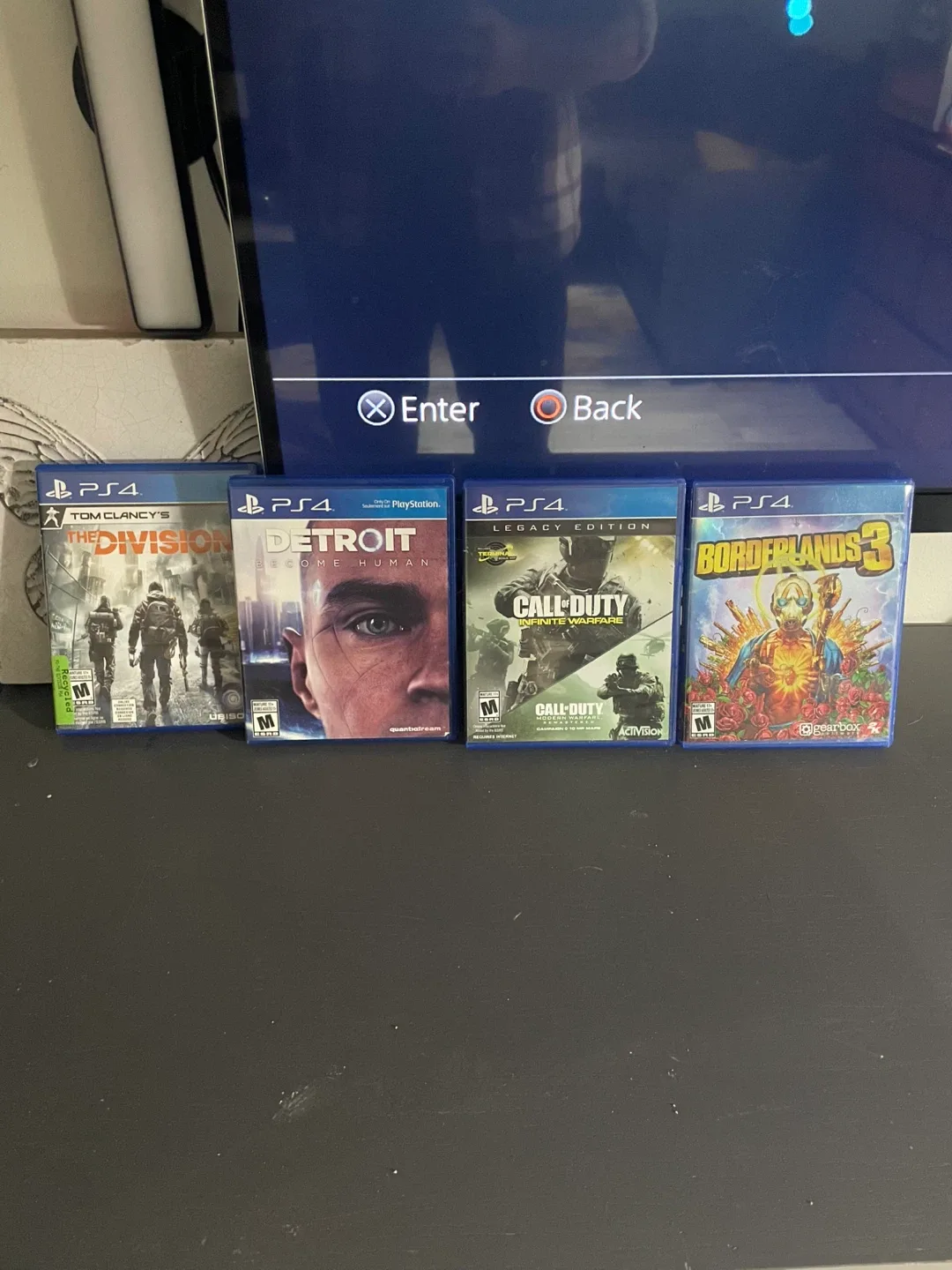 PlayStation 4 (PS4) with Games and Accessories image indicator(3)
