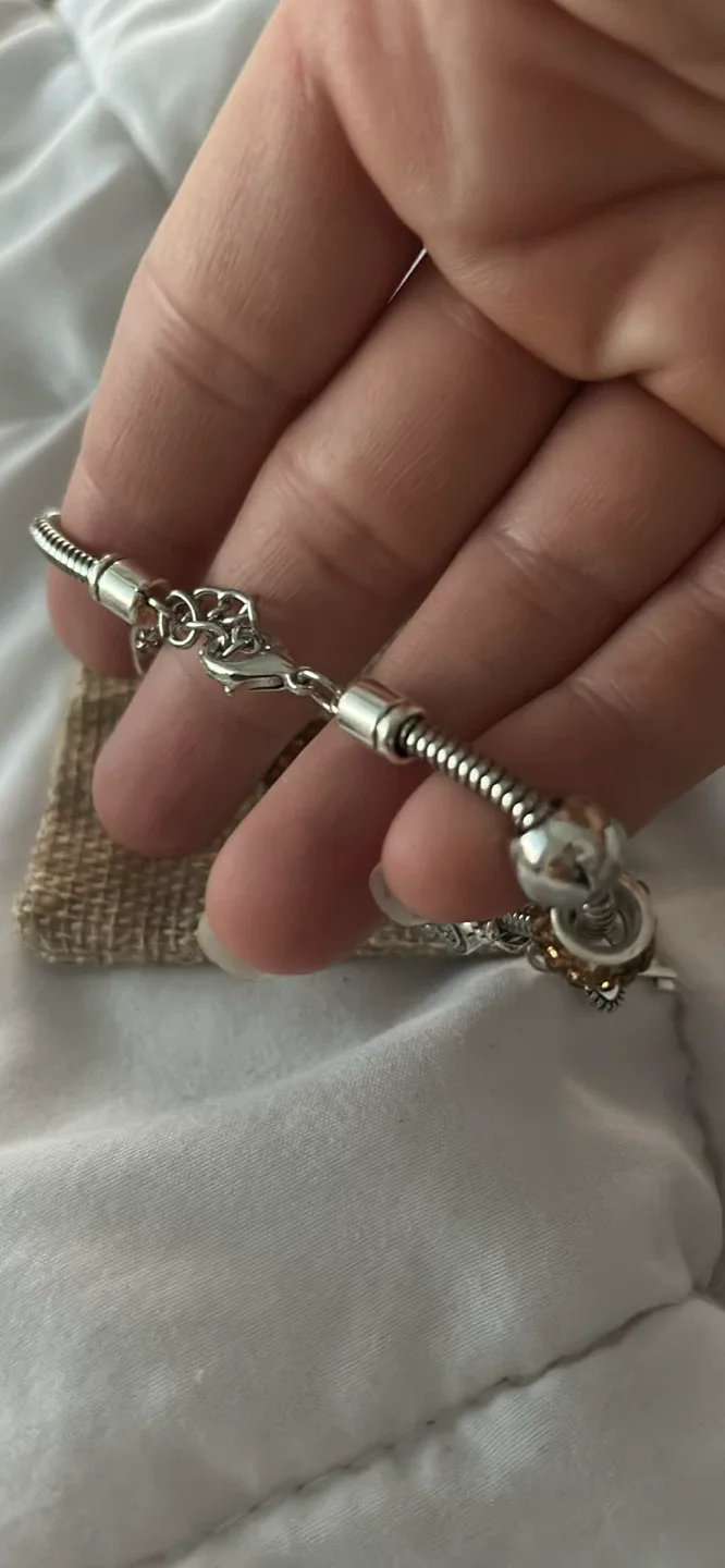 Charm Bracelet with Crown, Heart, and Key Charms image indicator(3)