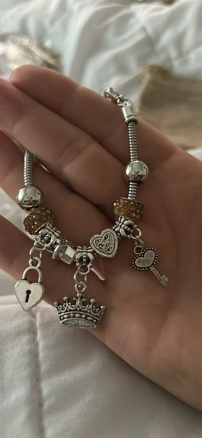 Charm Bracelet with Crown, Heart, and Key Charms image indicator(2)