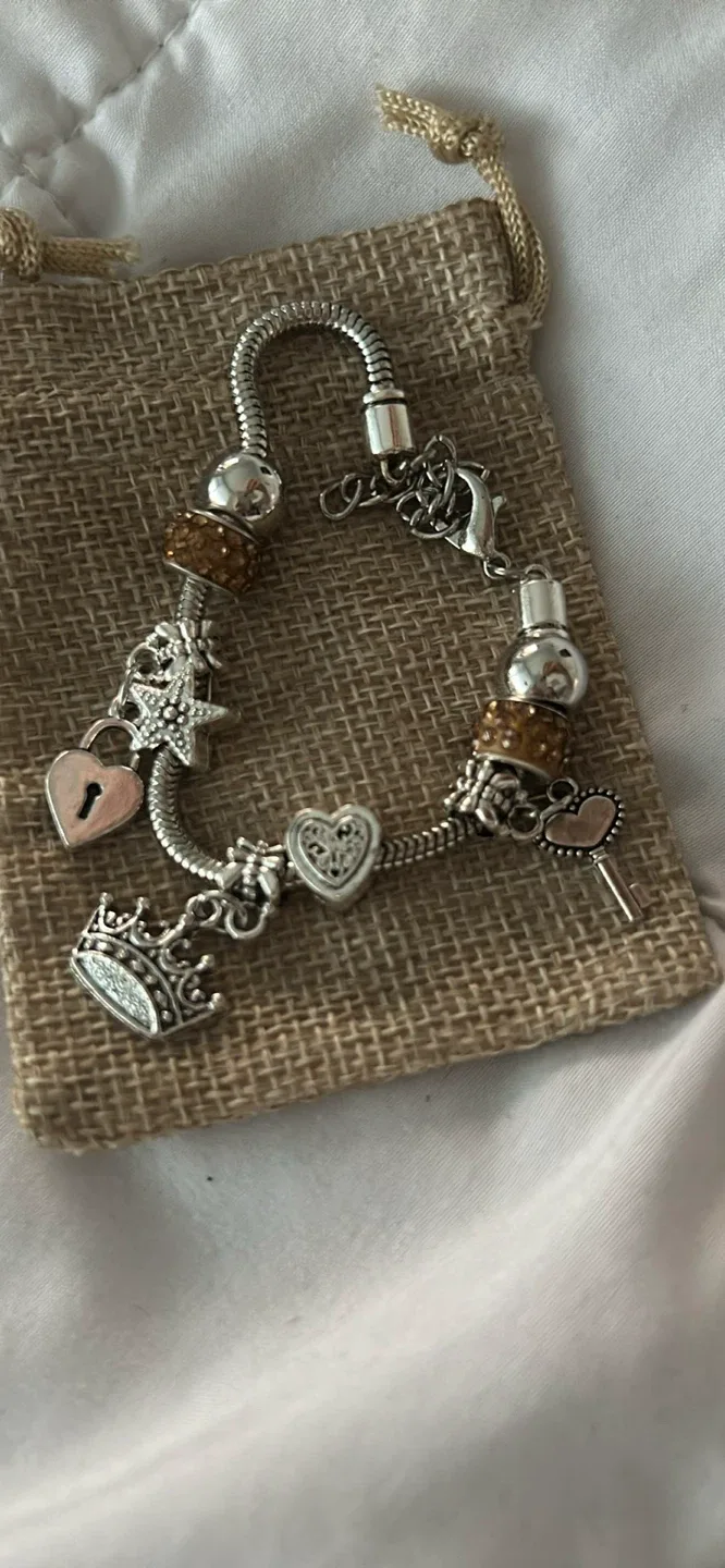 Charm Bracelet with Crown, Heart, and Key Charms image indicator(4)