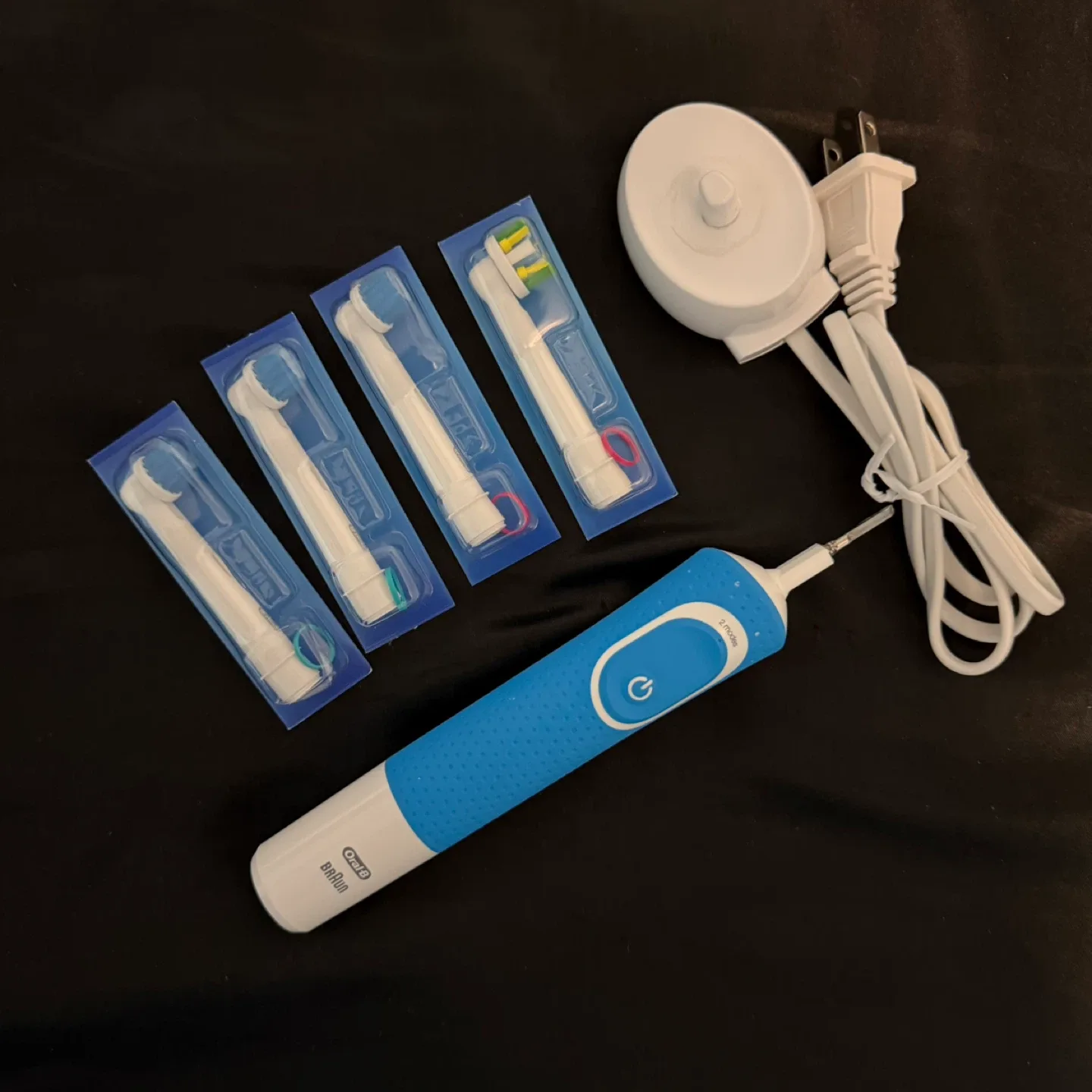 Oral-B Electric Toothbrush + 4 Brush Heads