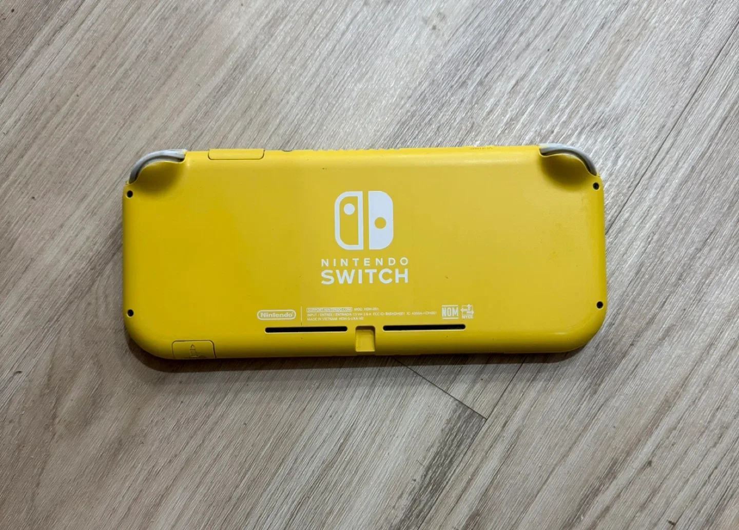 Nintendo Switch Lite with 2 Games image indicator(2)