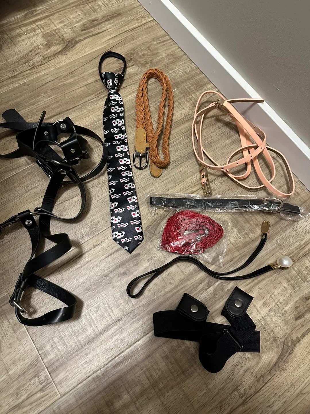 Assorted Belts, Tie, and Accessories