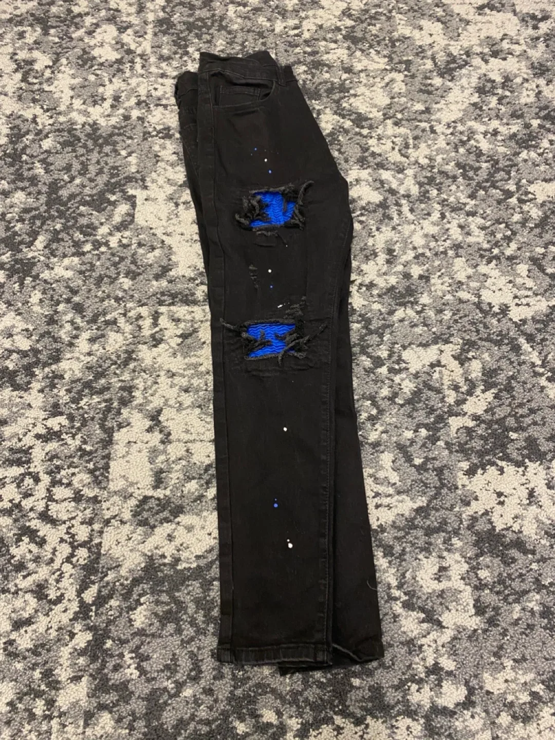 Black Ripped Jeans with Blue Patches image indicator(4)