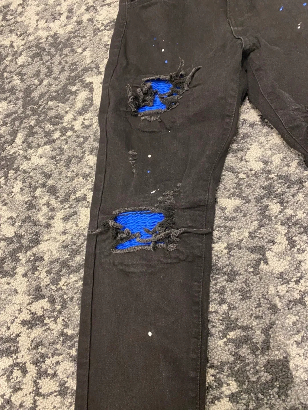 Black Ripped Jeans with Blue Patches image indicator(3)